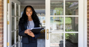 Property Manager standing in her doorway