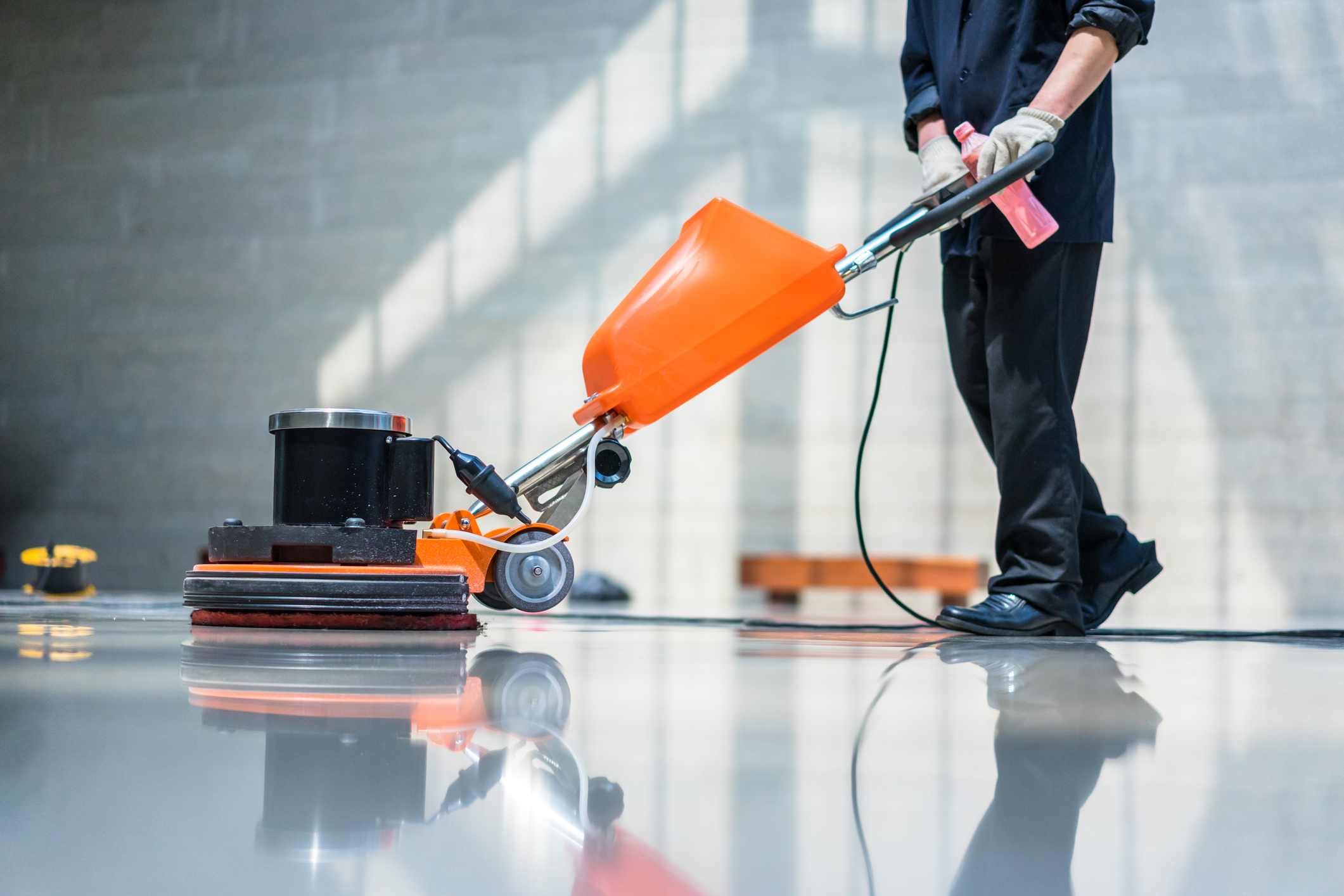 man with flooring machine, floor and carpet cleaning